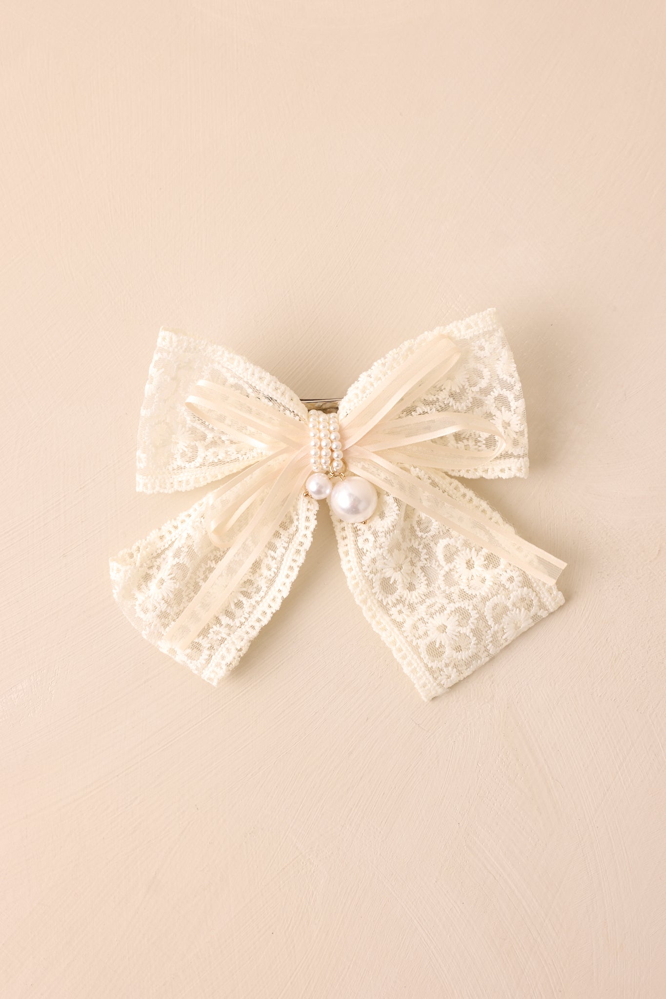 The Stardust Aegis Ivory Lace Clip In Bow