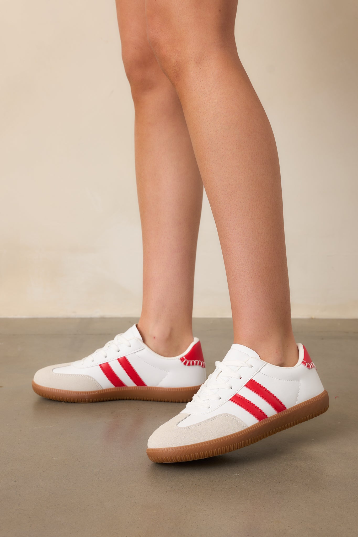 A new side view captures the curve of the sole, the placement of the ricrac stripes, and the red ankle detail from a fresh perspective.