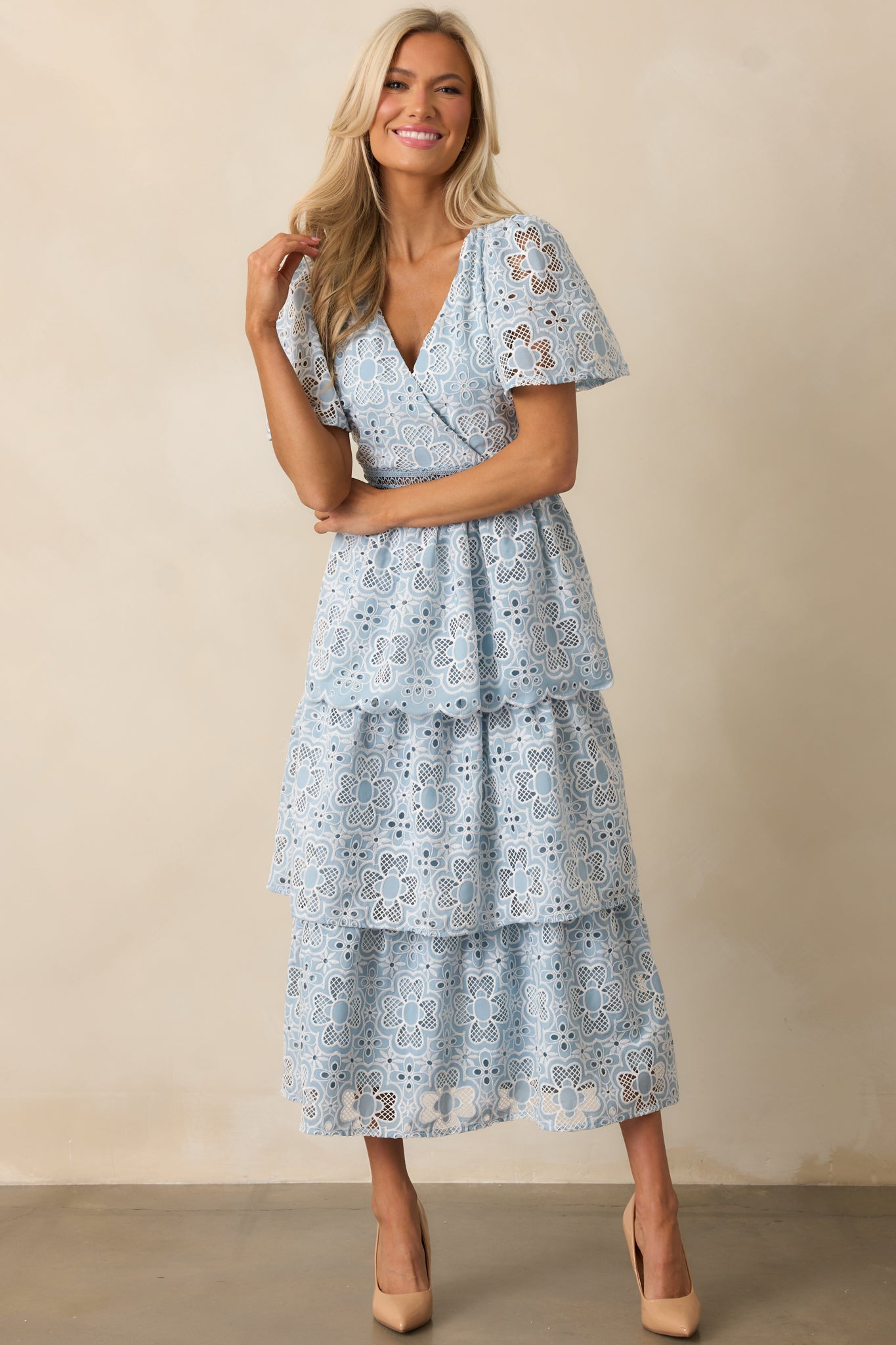 The blue dress drapes beautifully, with soft tiers and a flattering waistline accentuated by ladder trim