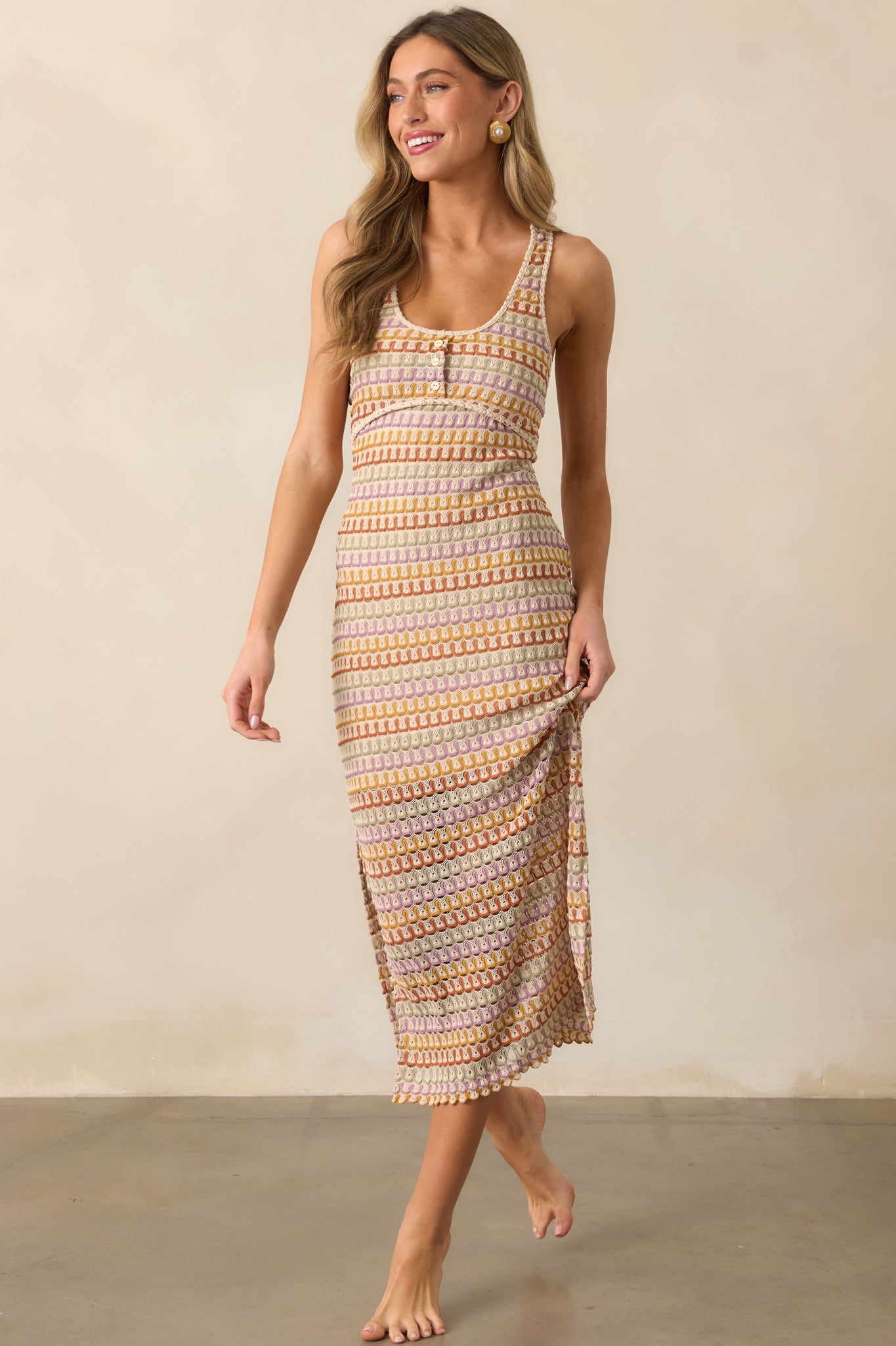 The natural multi dress features a flattering scoop neckline and a mini skirt underlay, perfect for warm-weather outings.