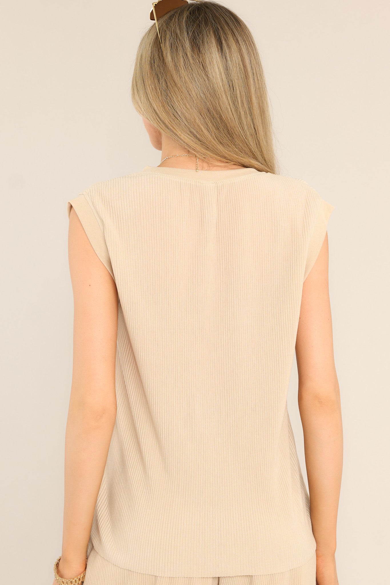 Back view of this top that features a crew neckline and ribs throughout.