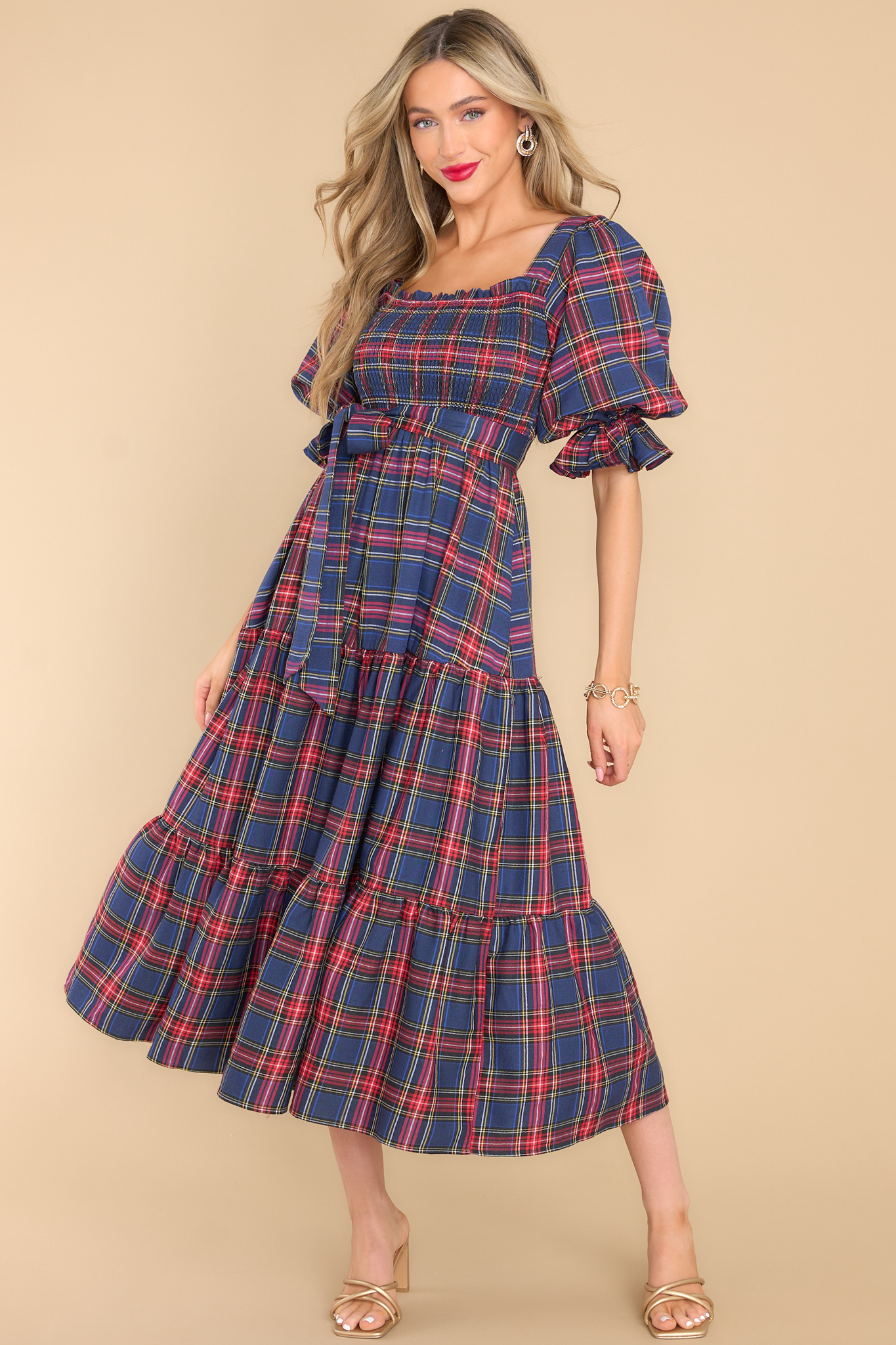 Full body view of blue plaid dress featuring a square neckline. 