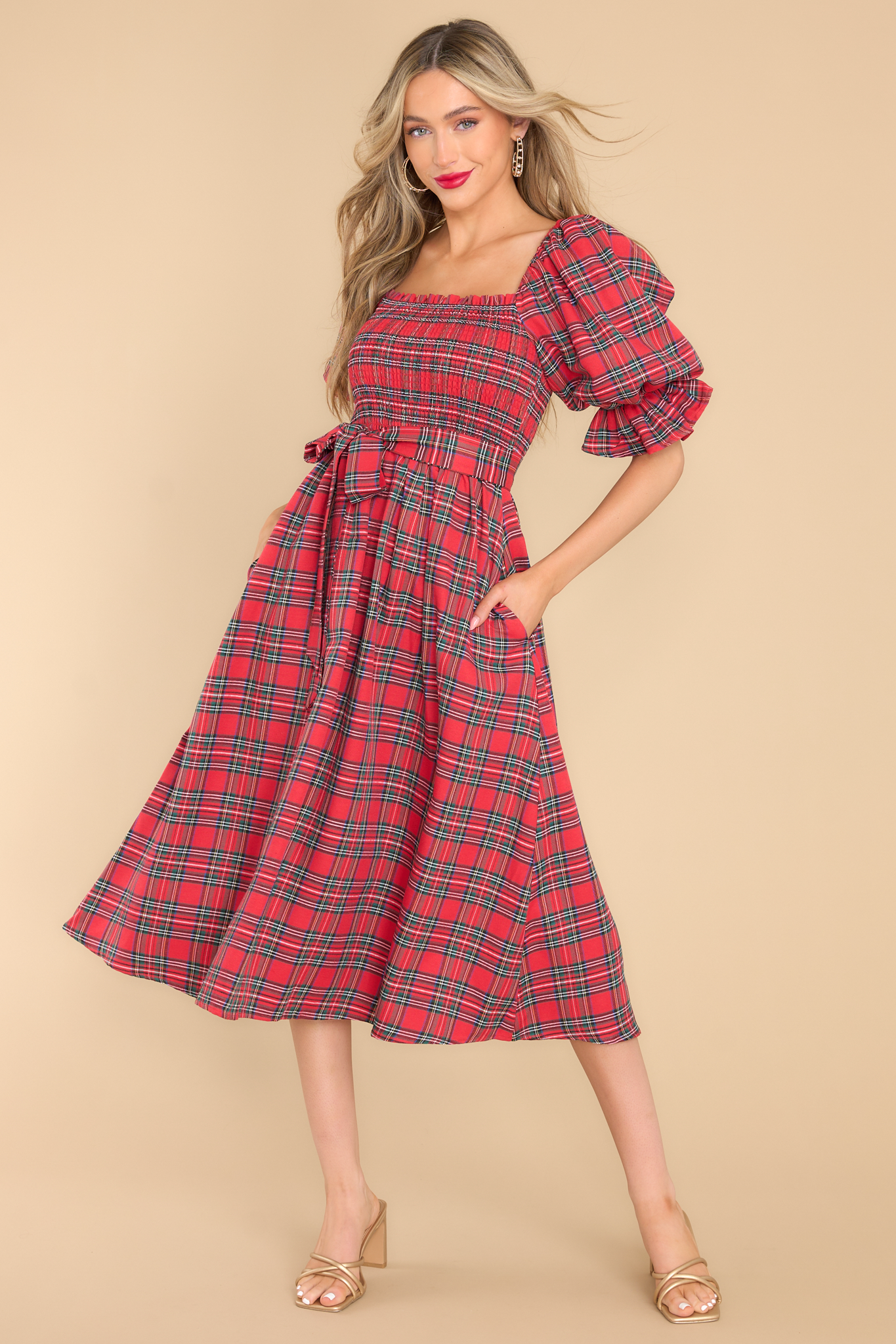 Full body view of red plaid dress featuring a square neckline. 