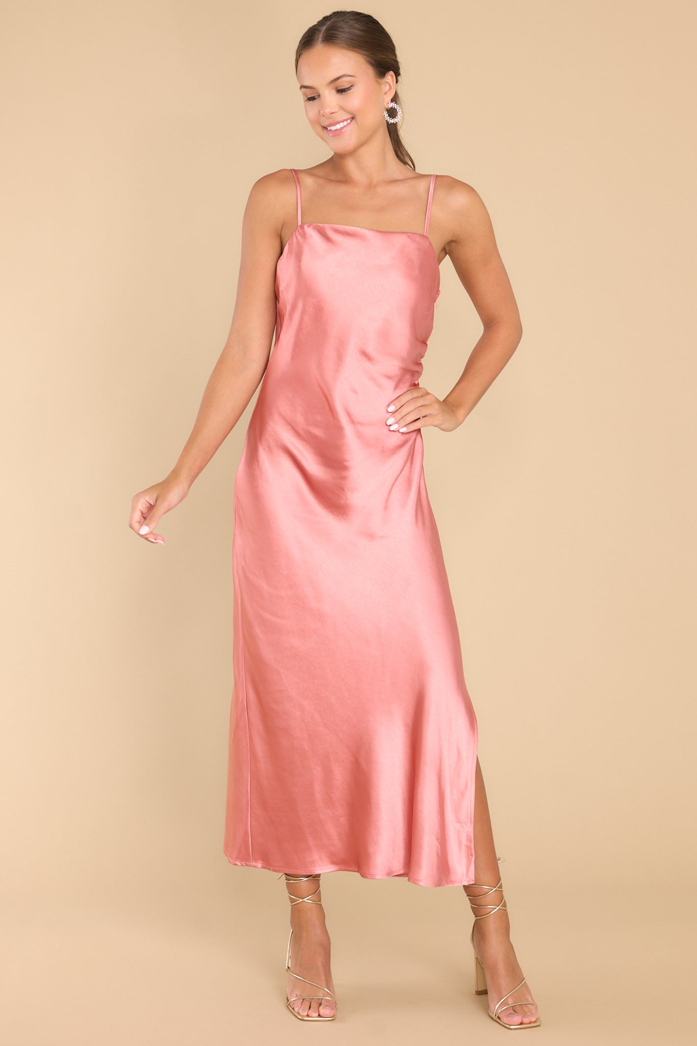 Full body view of this dress that showcases the satin like finish of the fabric.