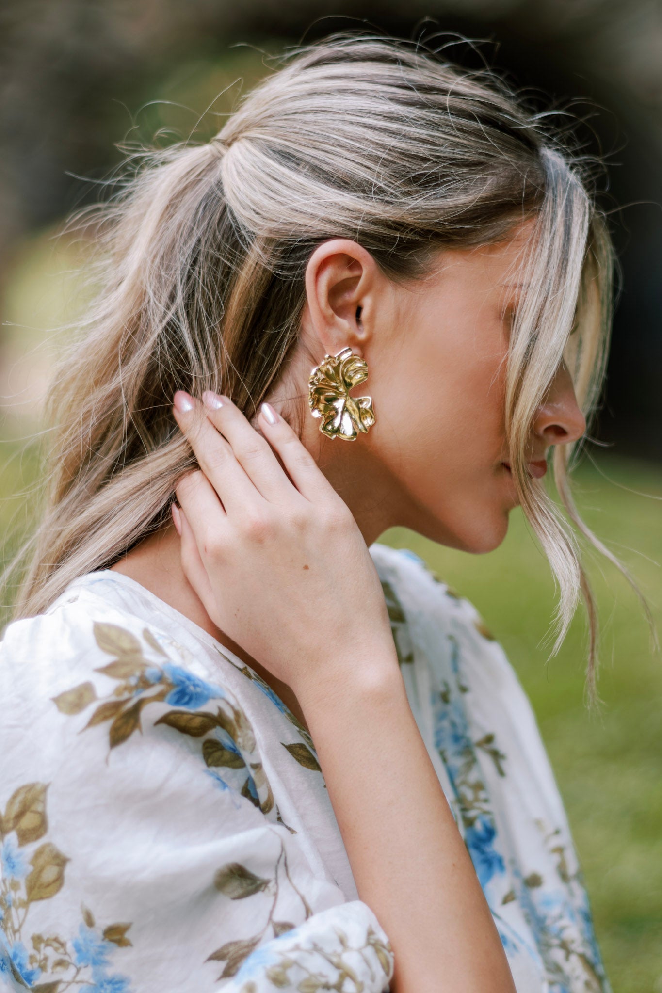 These earrings feature gold hardware and a secure posts backing.