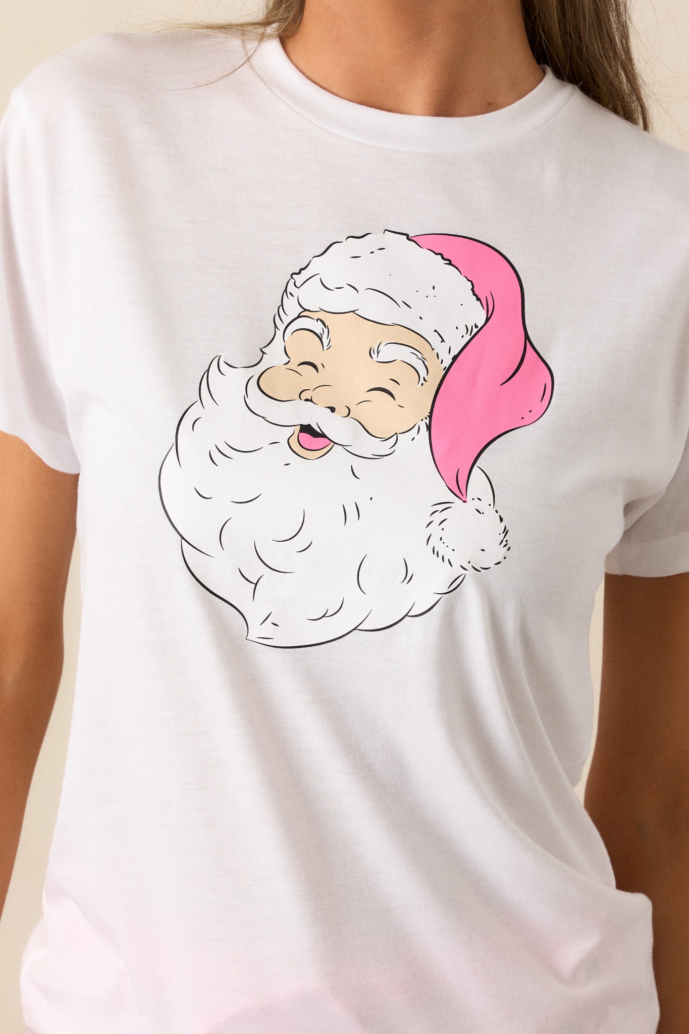 Detailed view of the Santa design, highlighting the colors and patterns used, emphasizing the festive spirit of the pajama top.