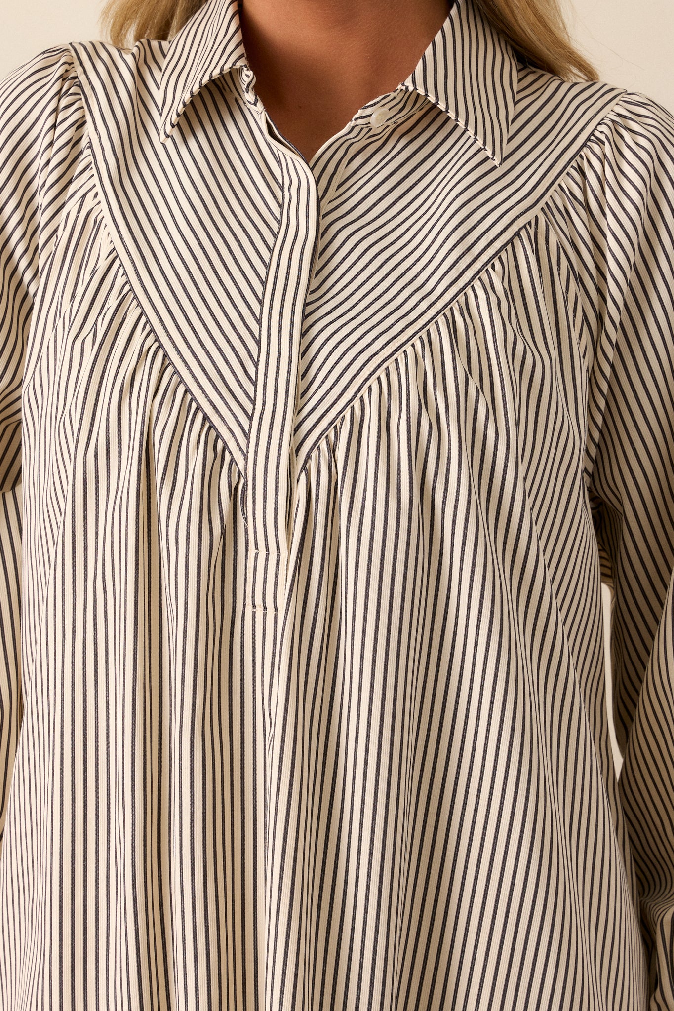 A zoomed-in shot of the diagonal stripe yoke detailing, highlighting the contrast between the diagonal, vertical, and horizontal stripe patterns.