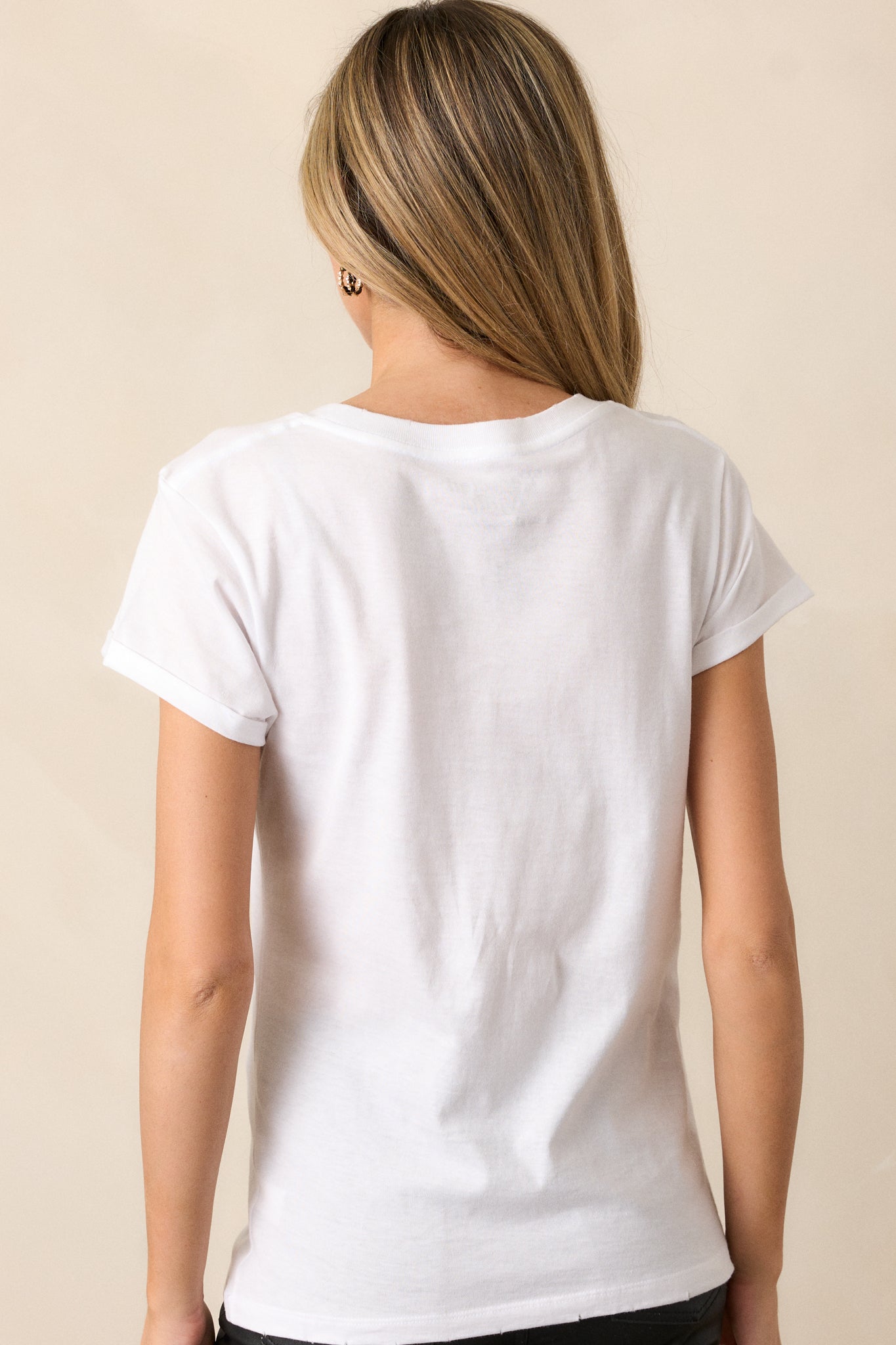 Back view of the tee, highlighting the clean lines and simple design, showcasing the back neckline while maintaining the focus on the ivory color.