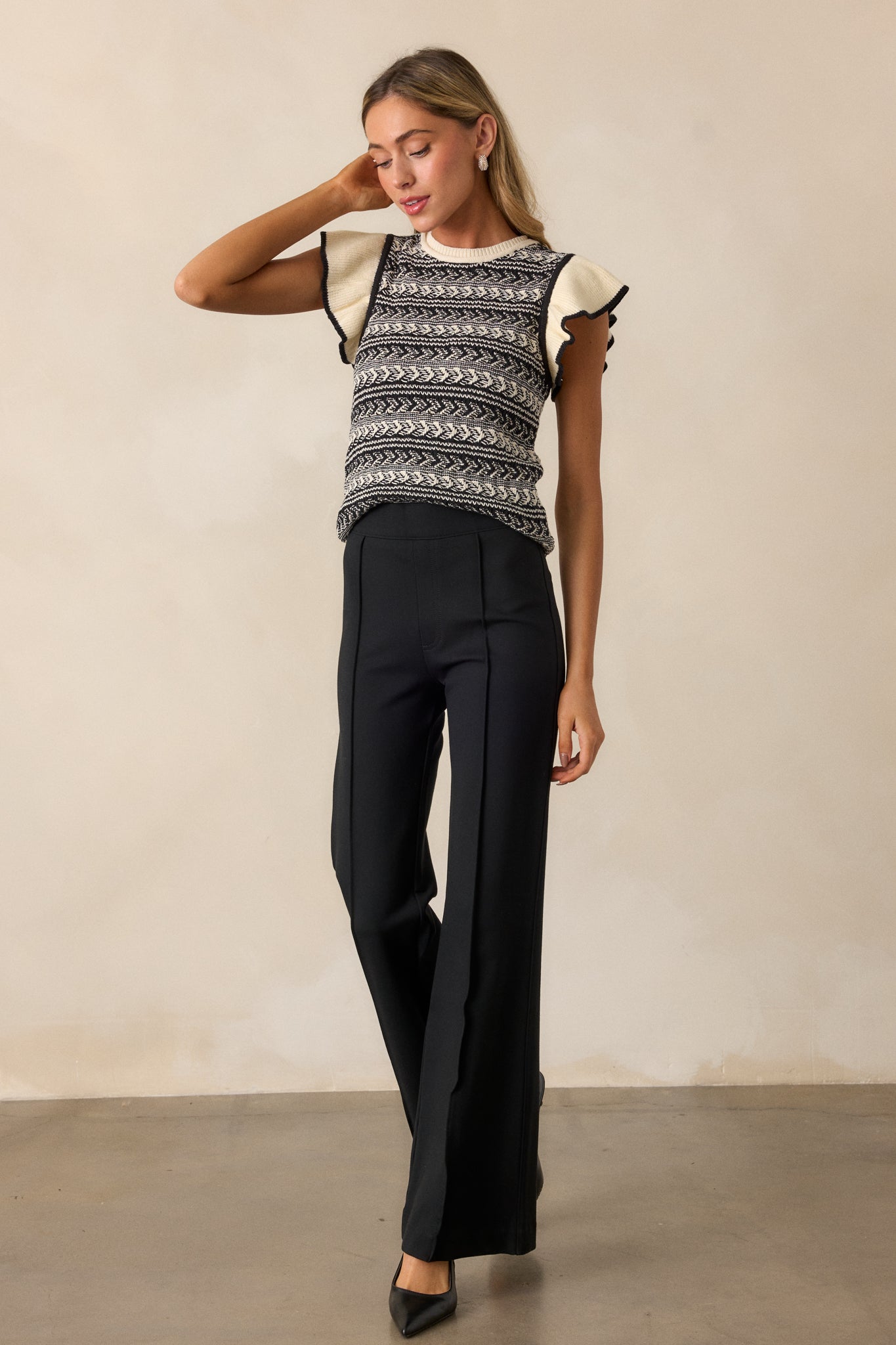 Another front view of the stretchy premium ponte fabric pants, showcasing the pull-on design that sits at the natural waist, displayed against a plain background