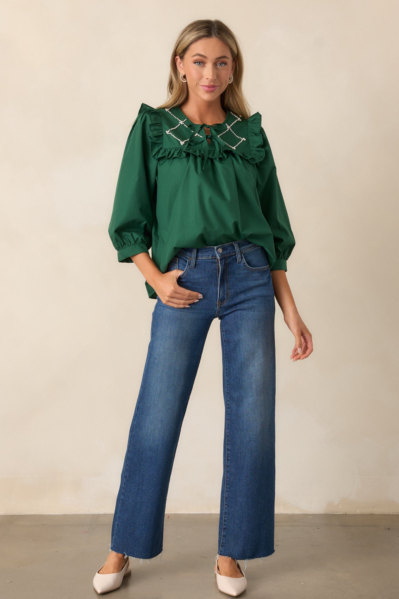 A complete profile of the hunter green top, highlighting the puff sleeves and keyhole neckline with self-tie bows. The faux pearl lattice yoke with ruffle details is visible from this perspective.