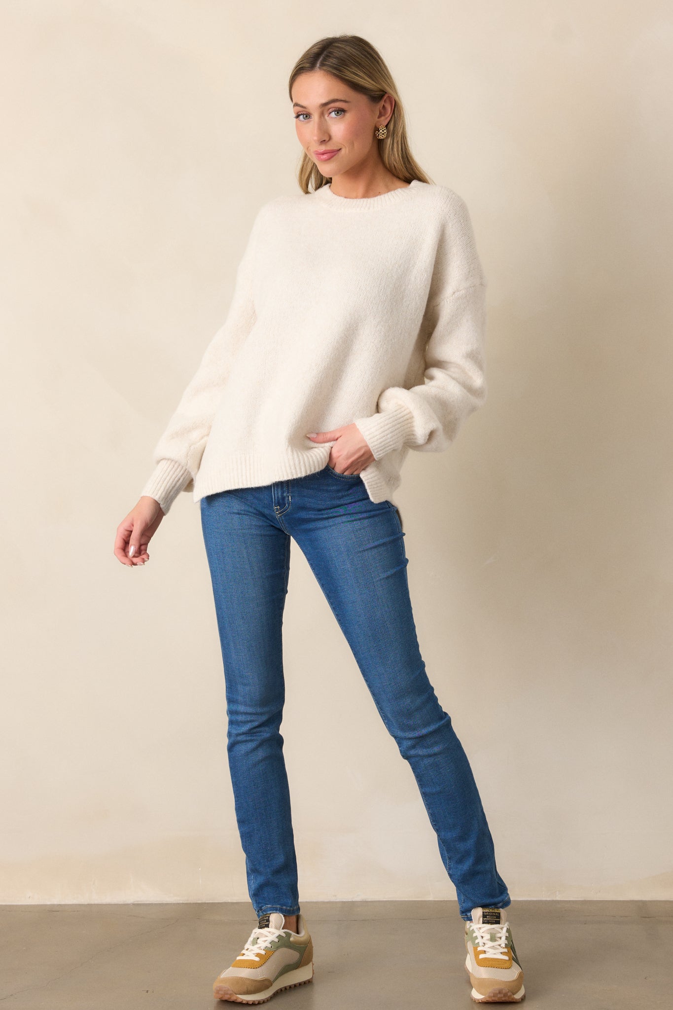 A full-length view of the sweater, showcasing its playful and unique design, perfect for chilly days.