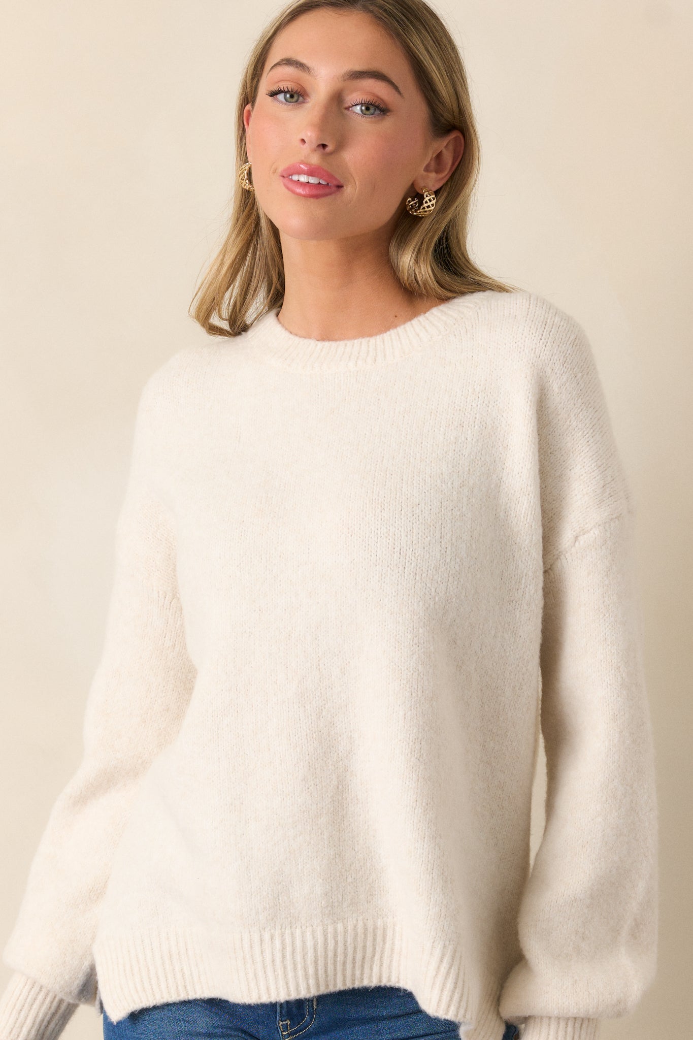 A cropped front view of the sweater, emphasizing its casual yet stylish design and high-quality material.