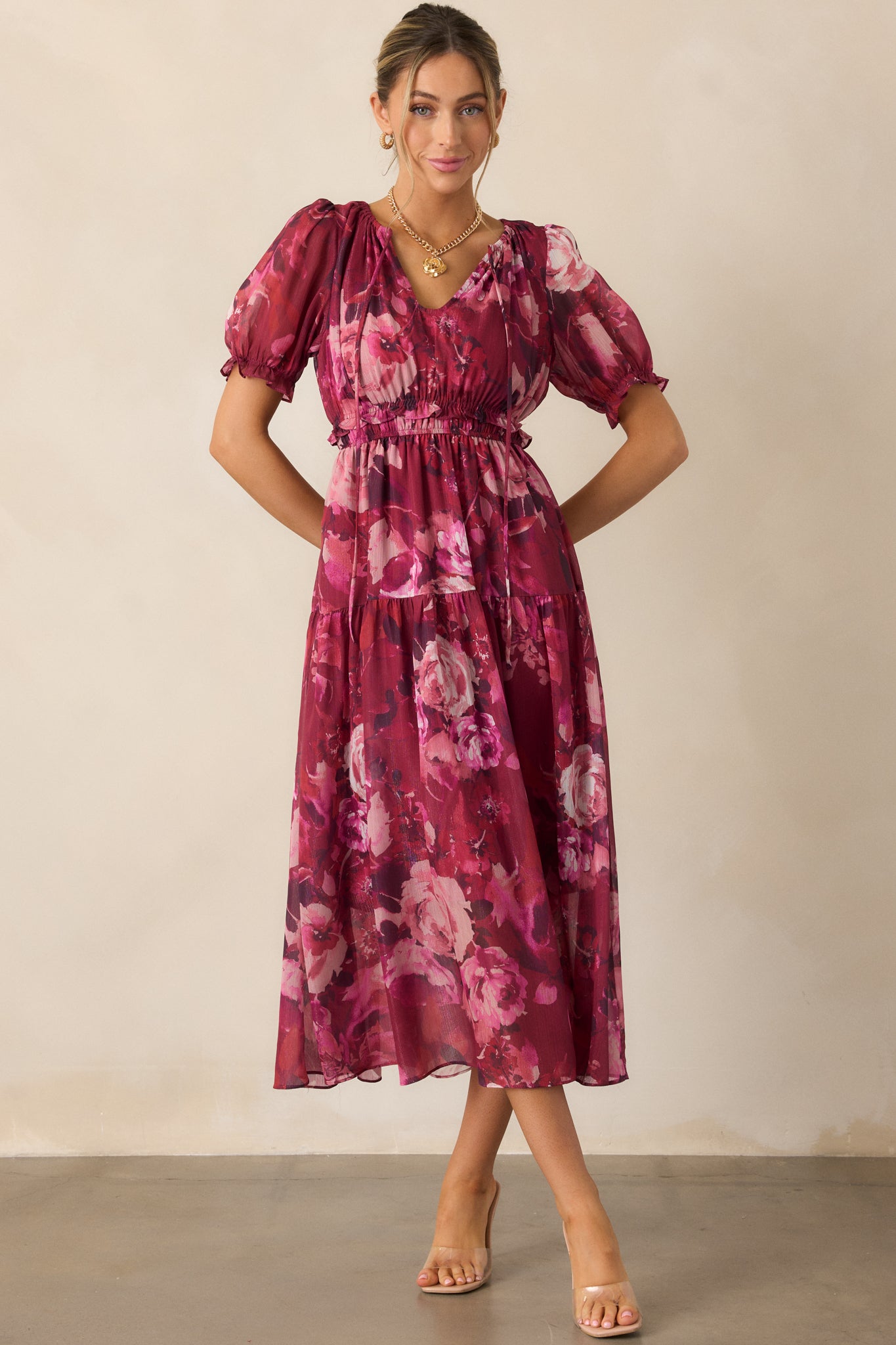 A front-facing view of the berry maxi dress, showcasing its rounded keyhole self-tie neckline, smocked waistband, and flowing maxi length.