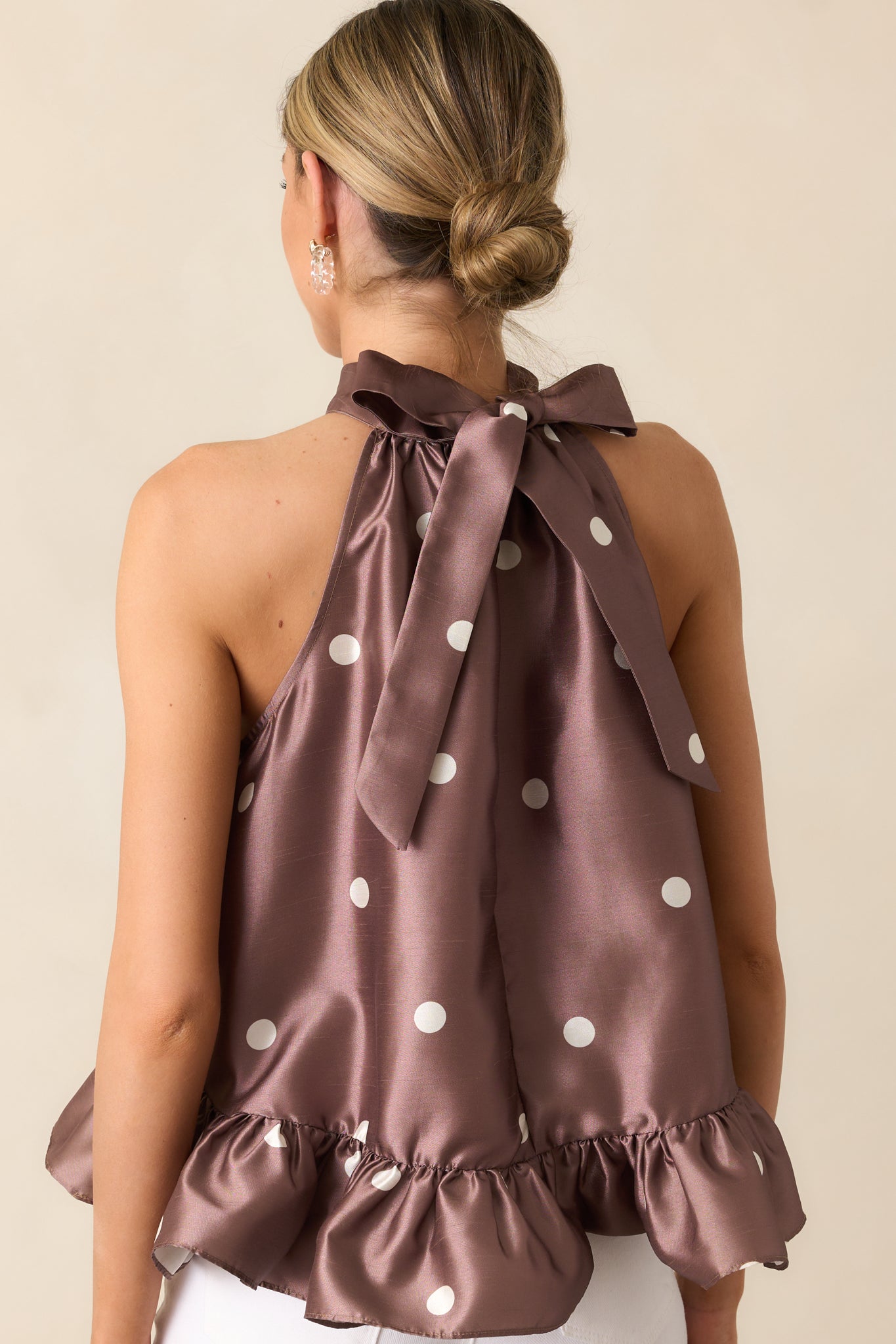 Back view of the chocolate halter top highlighting the self-tie closure and relaxed fit.