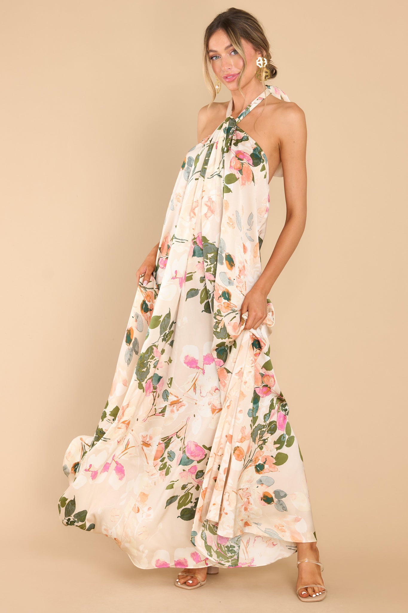 Full body view of  this dress that features a flowy fit throughout.