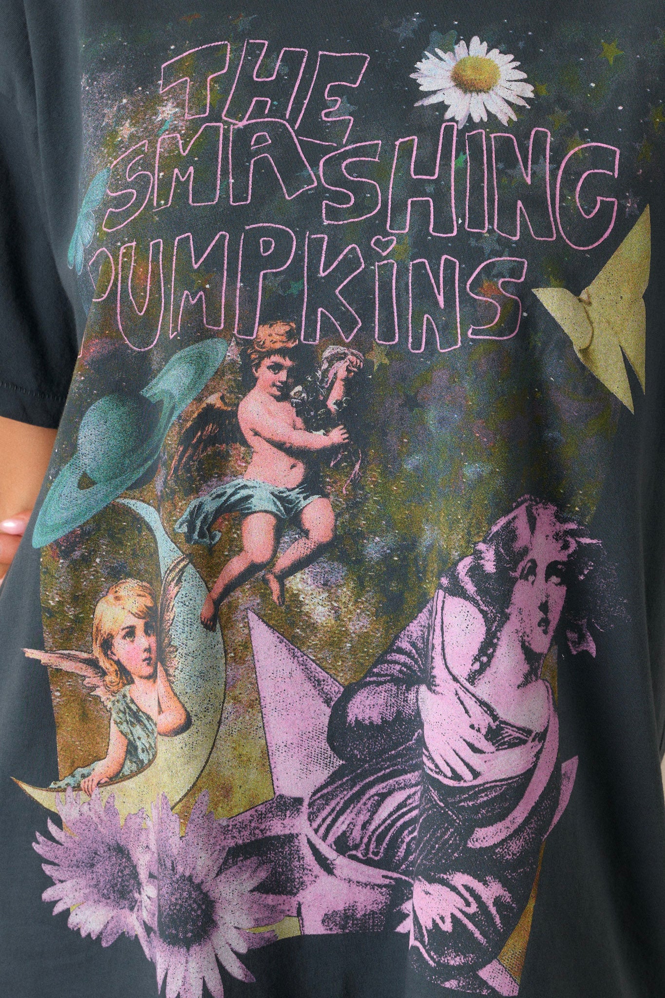 Close up of the album inspired artwork on a Smashing Pumpkins short sleeve graphic tee. 