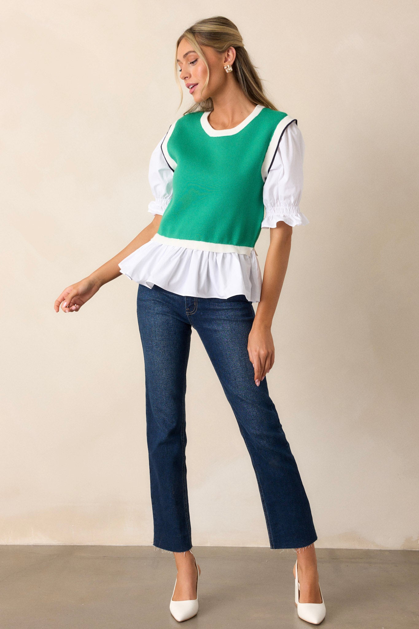 Full length view of a green top featuring durable green material and puff sleeves