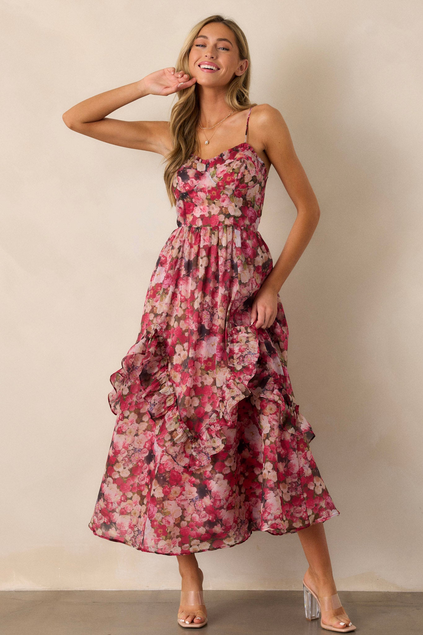 A full-length view emphasizing the movement of the ruffle tiers as the dress falls gracefully below the knee.