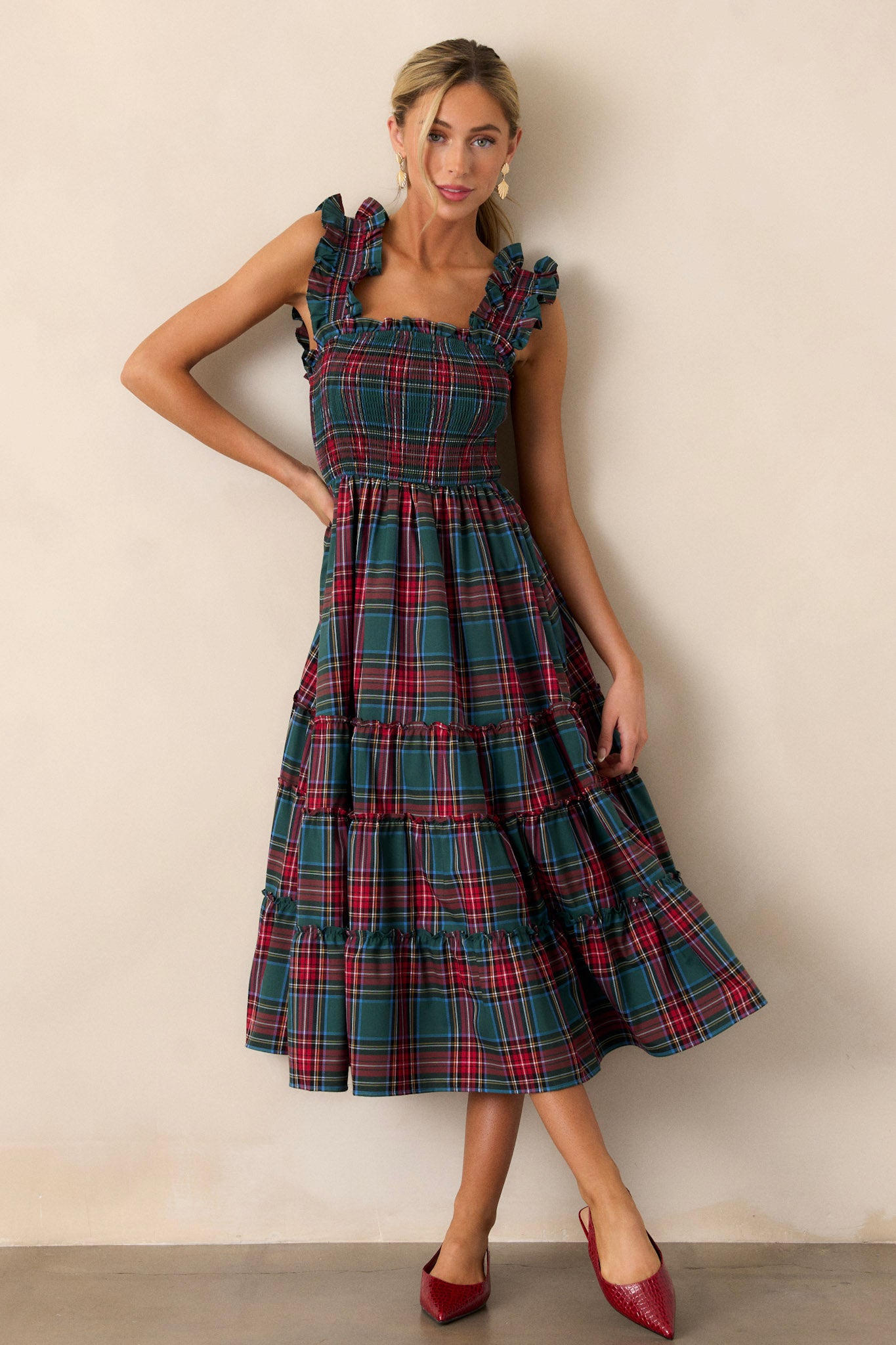 Full body view of this dress that features a tiered skirt.