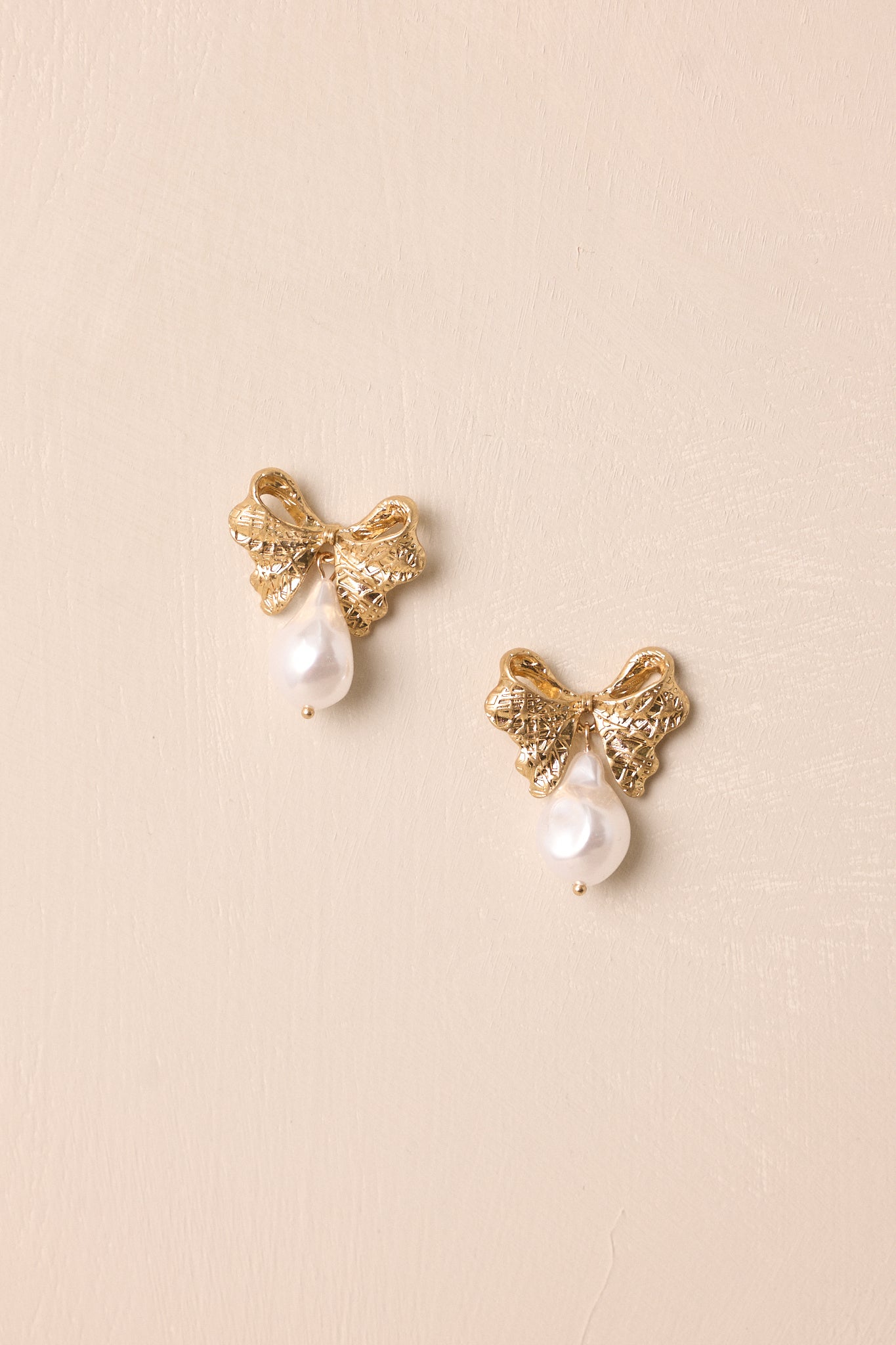 Fleeting Glance Gold & Ivory Pearl Bow Earrings