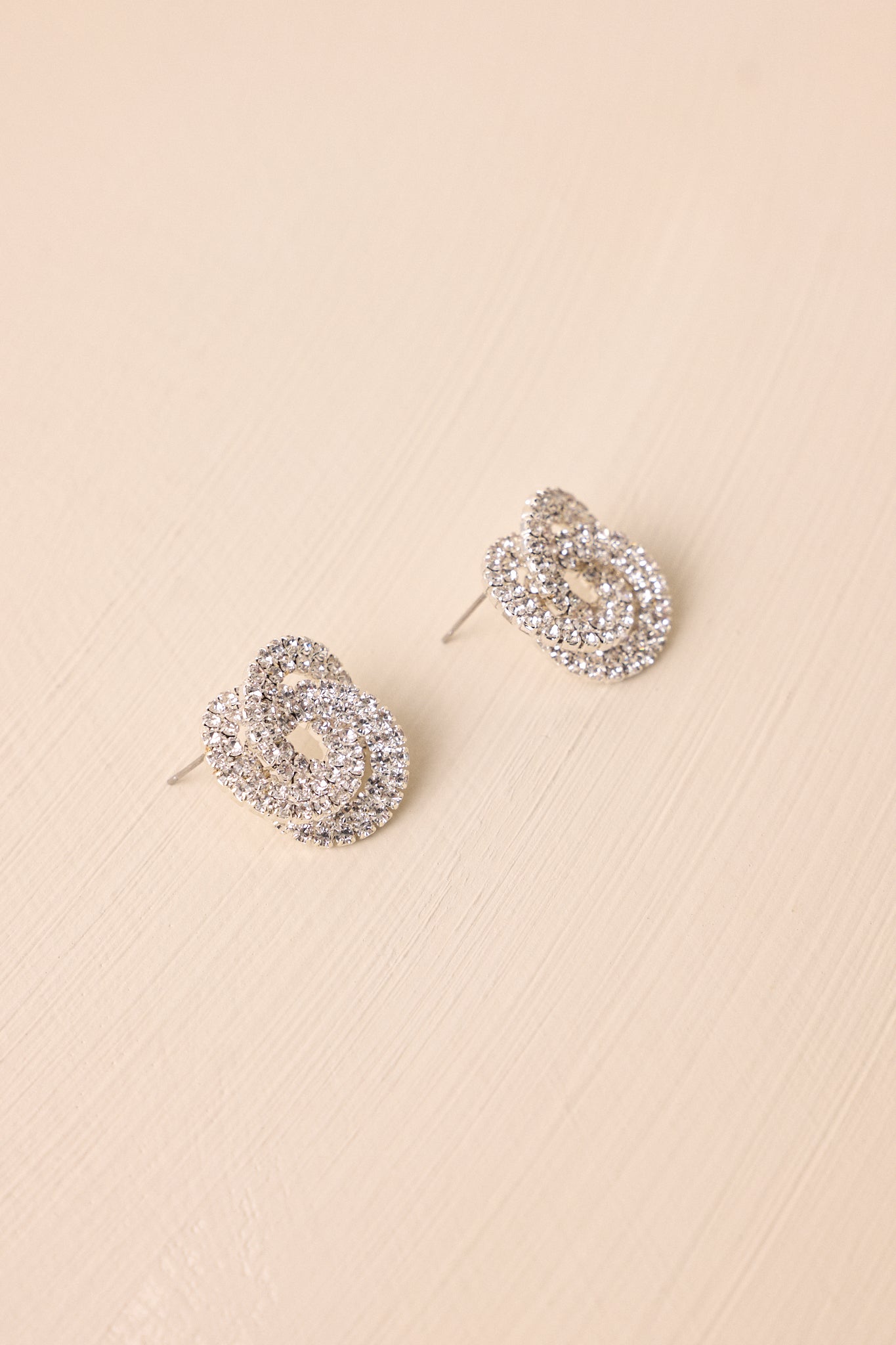 Beneath The Sky Rhinestone Encrusted Knot Earrings