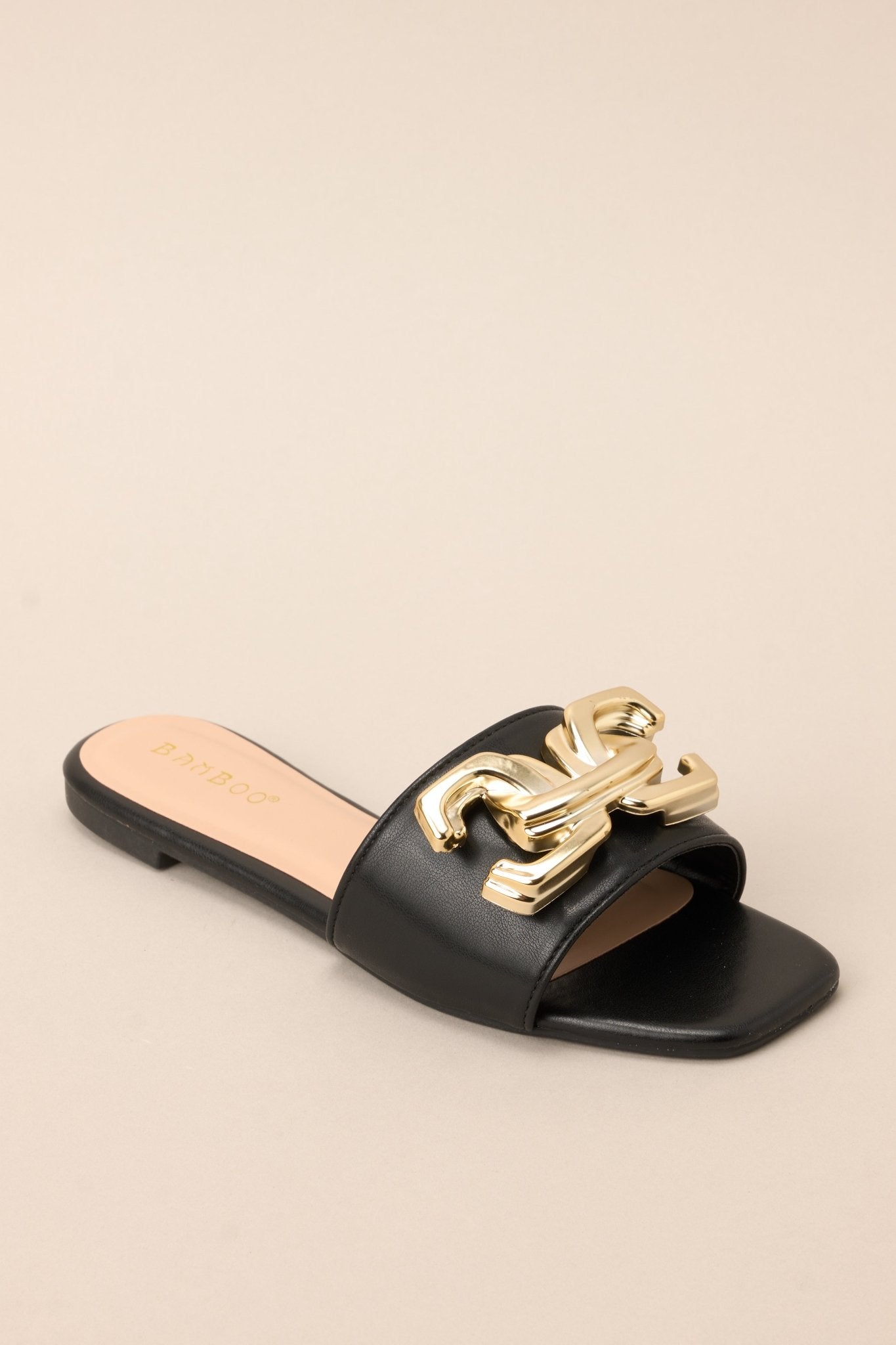 Black sandals with gold buckle shop