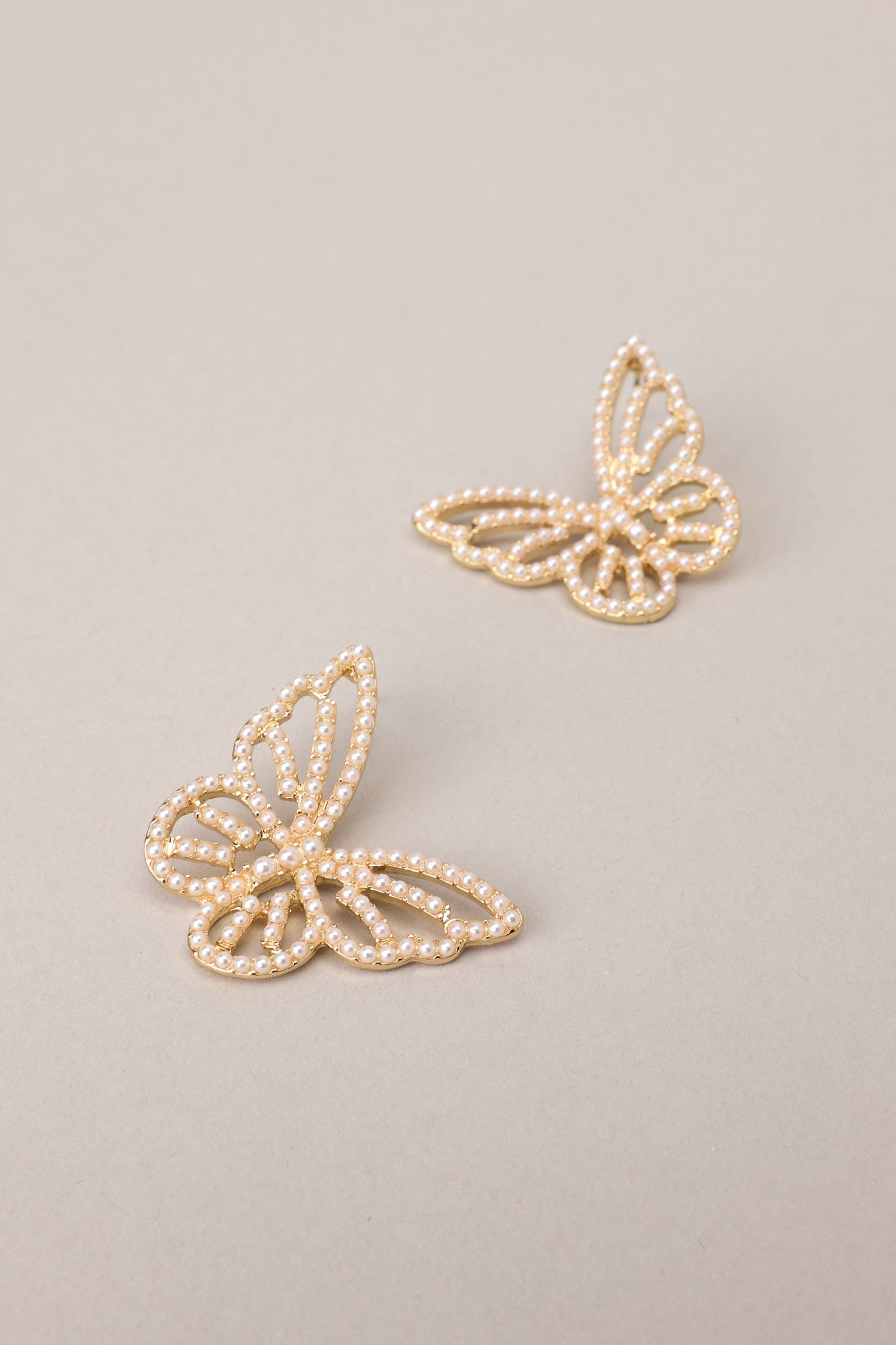 Graceful Flutter Gold Pearl Butterfly Earrings - Red Dress