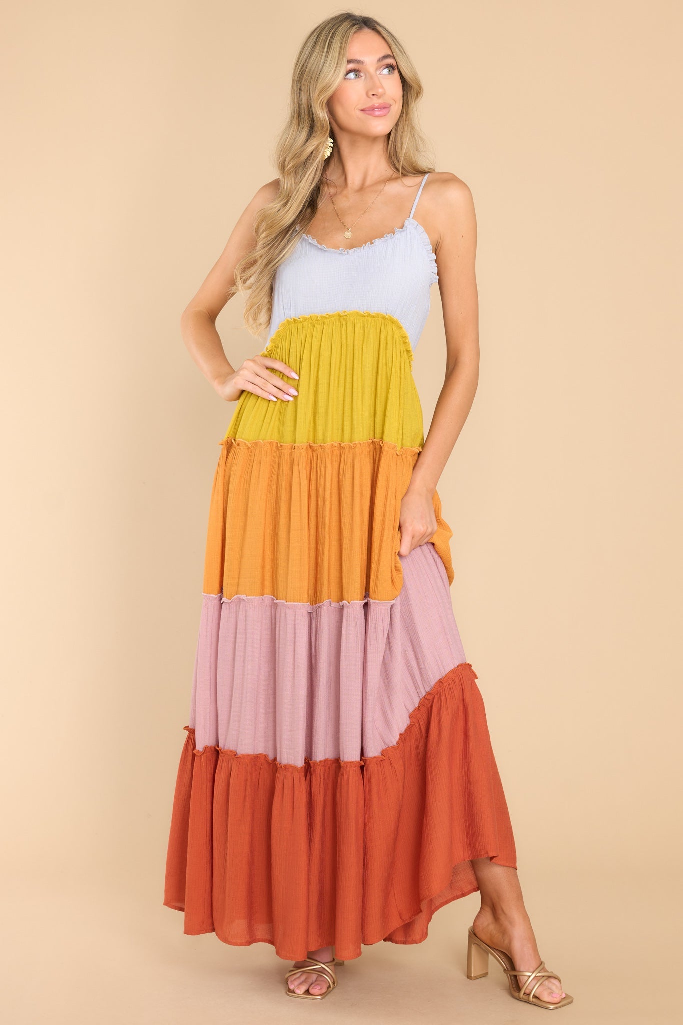 Front view of this dress that features a tiered skirt with ruffle detailing.