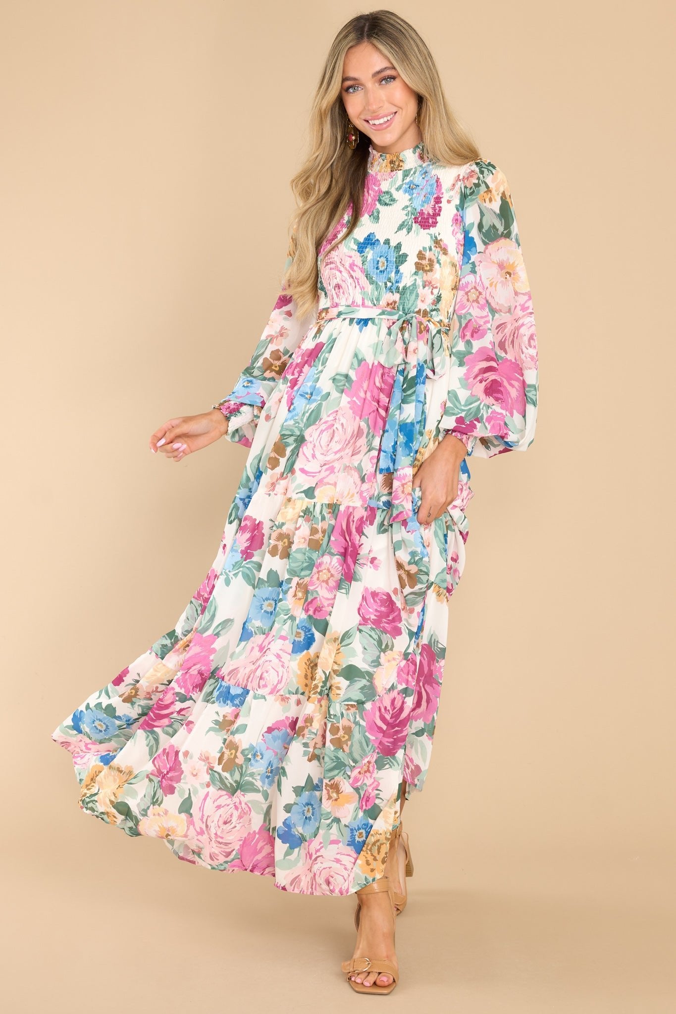 Full body view of this dress that features the floral pattern.