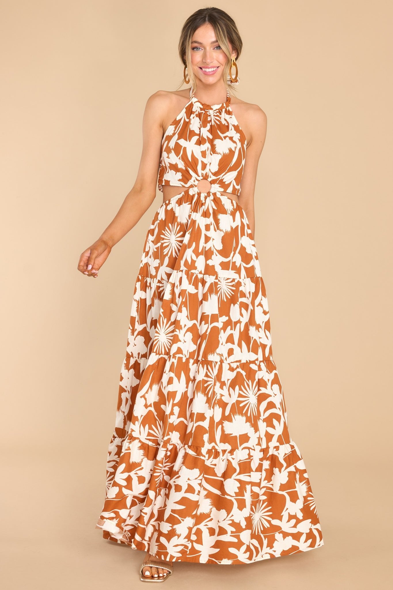 Front view of this dress that features a long flowy tiered skirt.